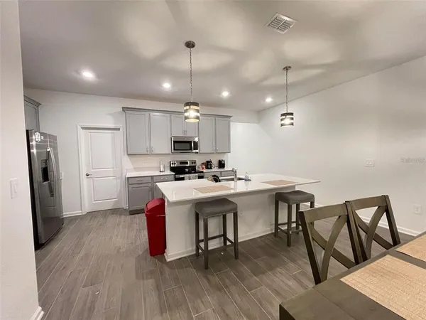 a view of a dining room with furniture