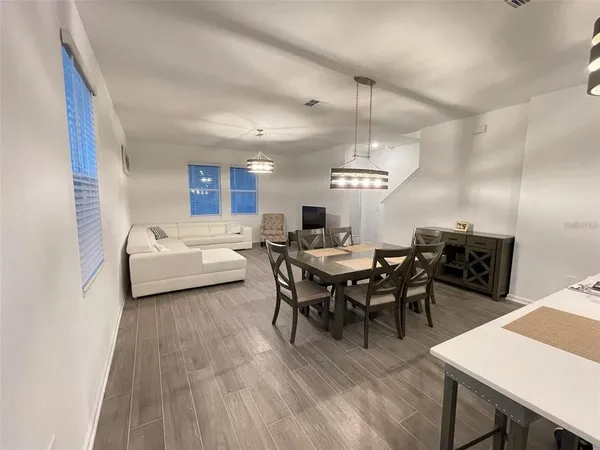 a view of a livingroom and dining room