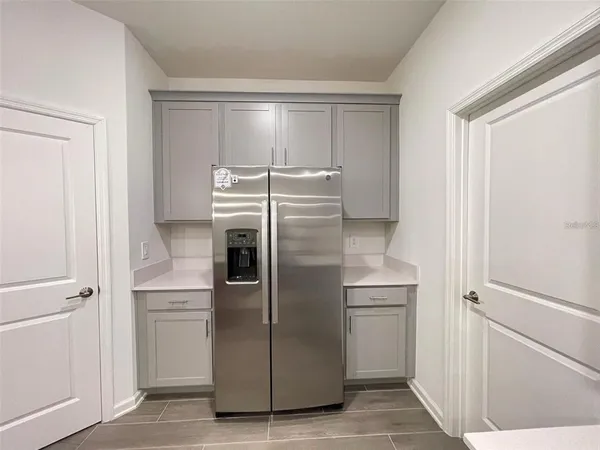 a storage room with washer and dryer