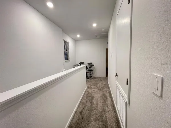 a view of entryway and workspace