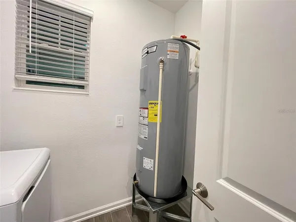 a view of a hallway with closet and garden