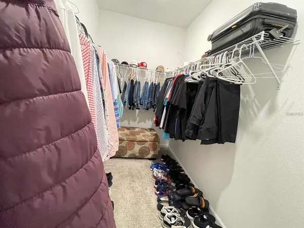 a bathroom with a sink and shower