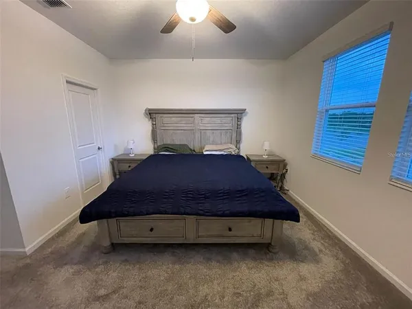 a view of a porch with wooden floor