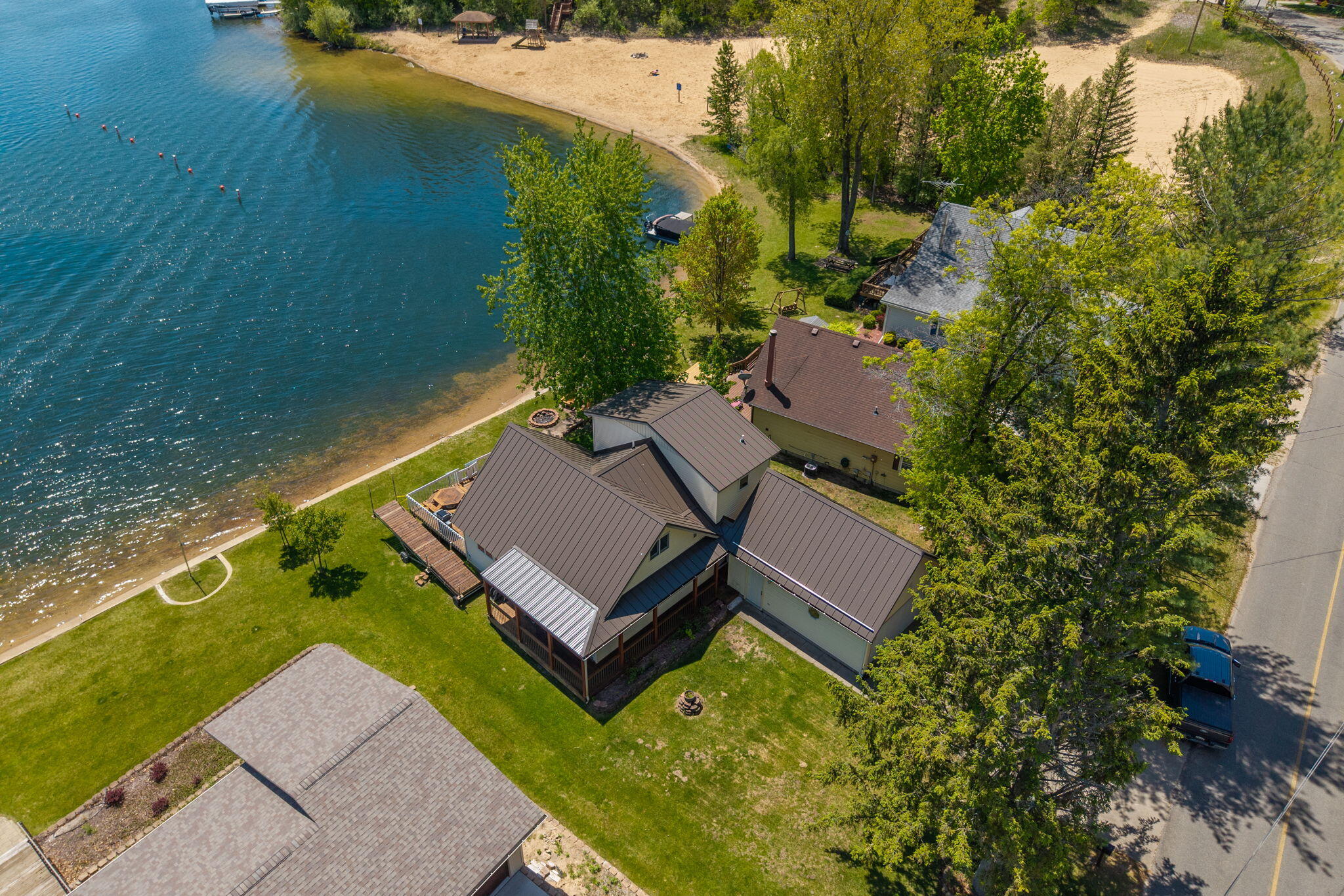 7945 West Royal Road Canadian Lakes, MI 49346 - Photo 1 of 28 1-web-or-mls-DJI_20250527012525_0284_D