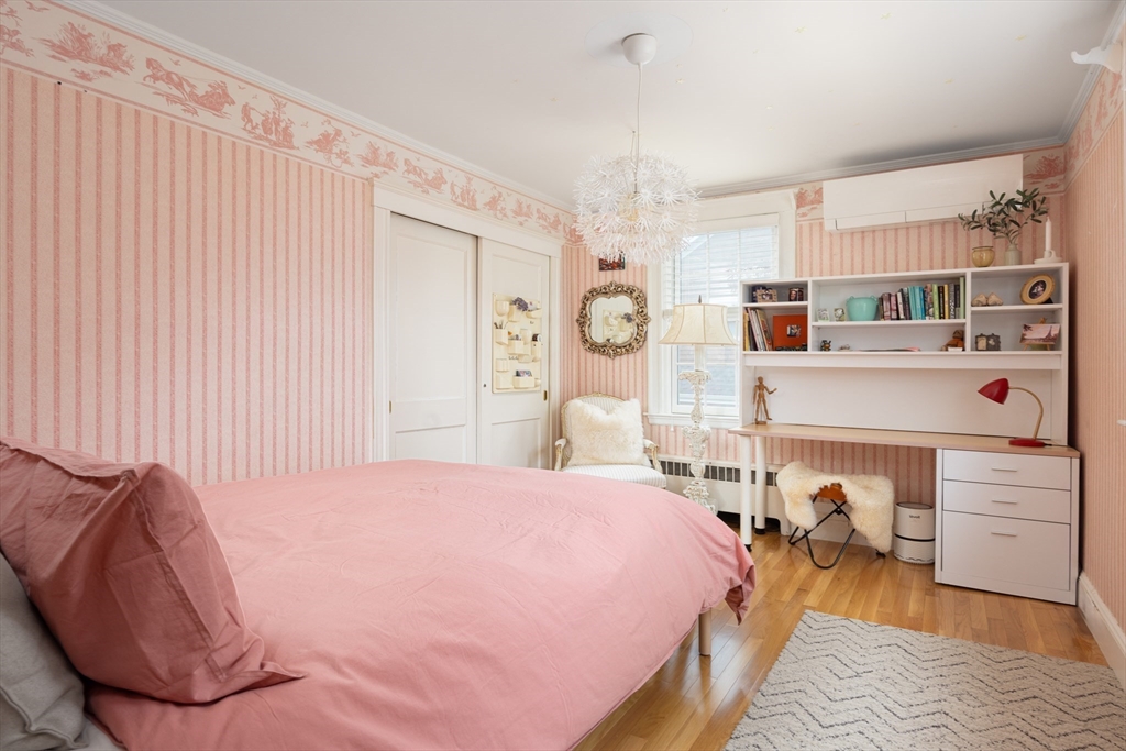228 Wolcott Road Brookline, MA 02467 - Photo 11 of 29 a bed room with a bed and a window