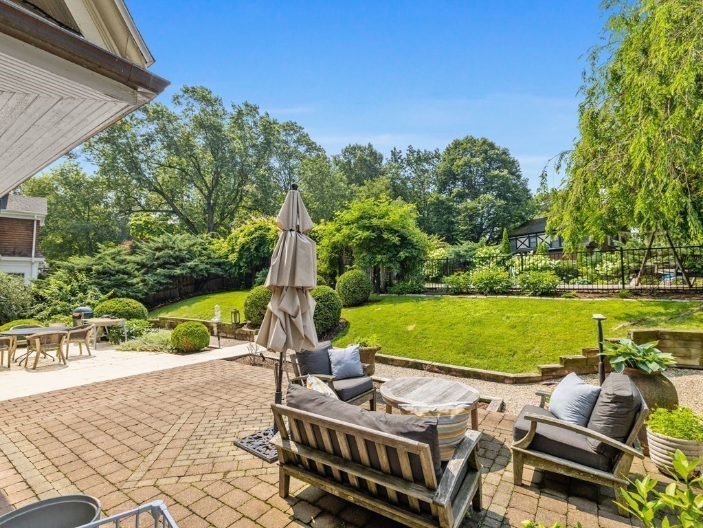 228 Wolcott Road Brookline, MA 02467 - Photo 19 of 29 a view of a yard with furniture
