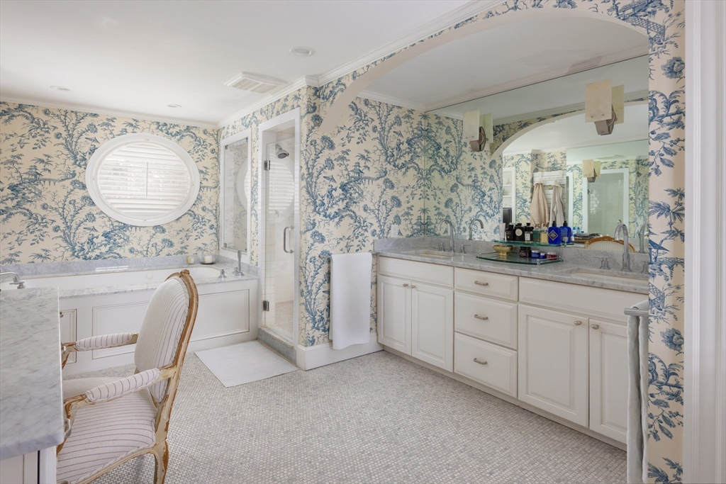 228 Wolcott Road Brookline, MA 02467 - Photo 10 of 29 a spacious bathroom with a double vanity sink mirror and