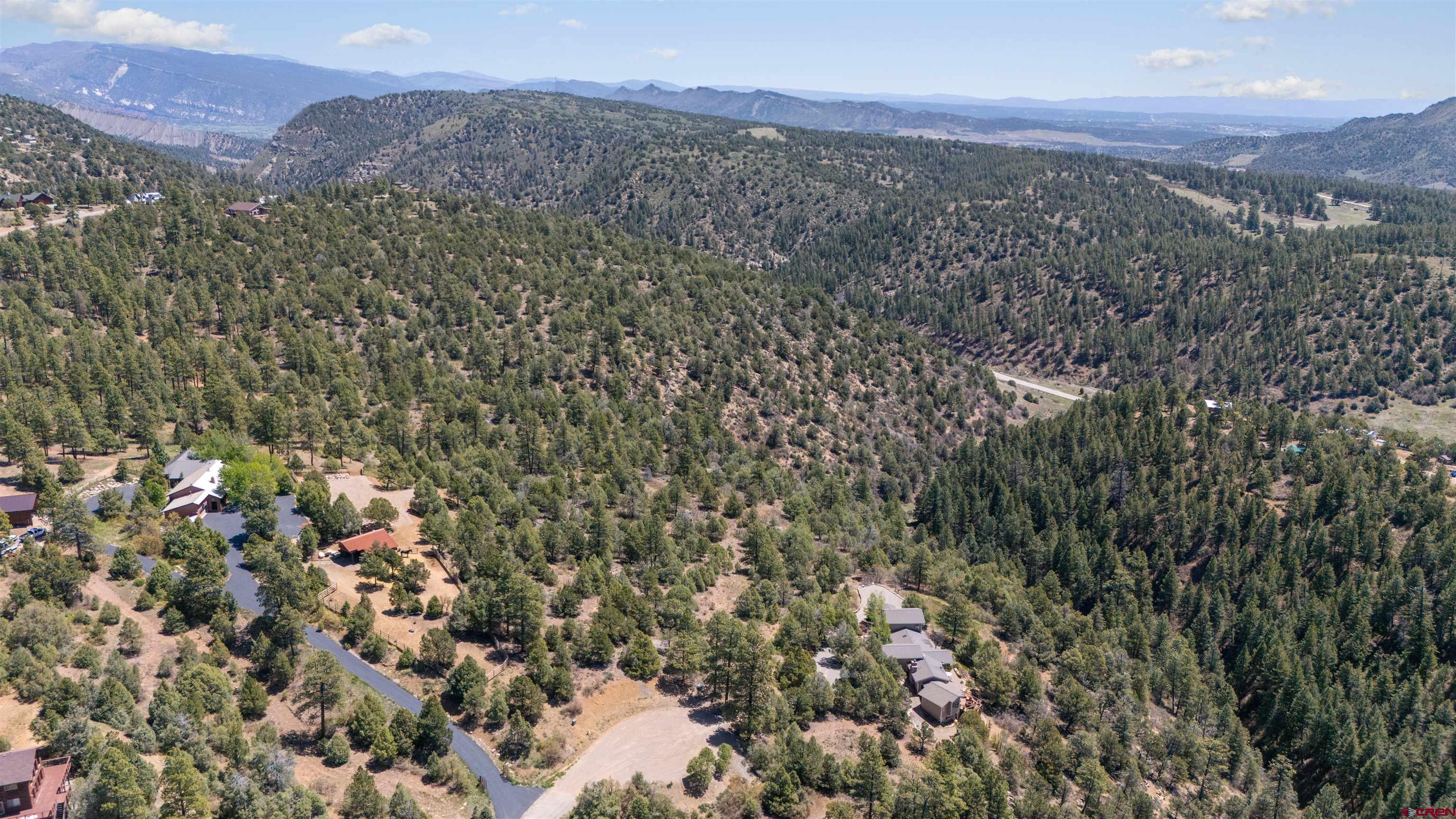 275 Logging Trail Road Durango, CO 81303 - Photo 2 of 6 a view of a city with mountains in the background