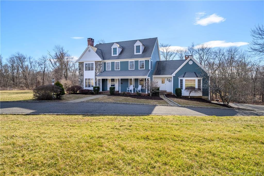 27 Hussars Camp Place Ridgefield, CT 06877 - Photo 1 of 1 a view of a house with swimming pool