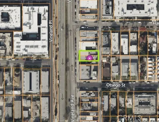 a picture of a glass door with a tree in front of it