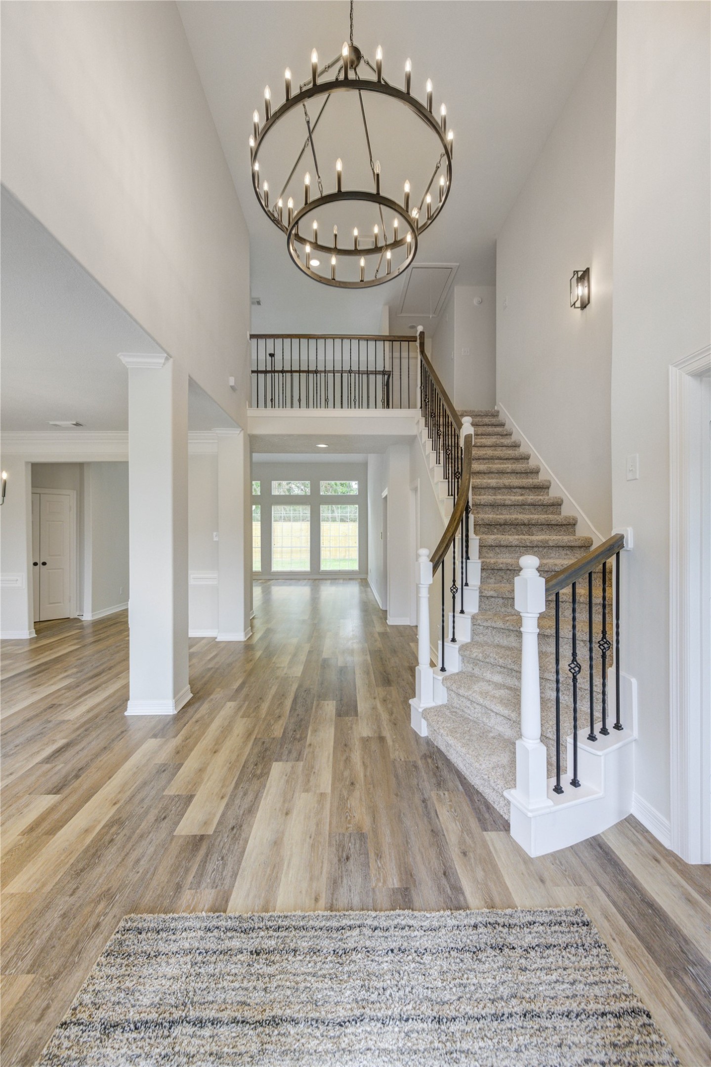 17318 Bonnard Circle Spring, TX 77379 - Photo 7 of 45 The foyer opens to a formal dining room on the left, the formal living room straight ahead and a home office on the right. You will love the new flooring throughout, and the chic and stylish light fixtures! The entire interior of the home has been freshly painted too!