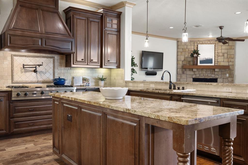 771 Hayden Road Lantana, TX 76226 - Photo 13 of 40 Wood flooring and stainless steel appliances!