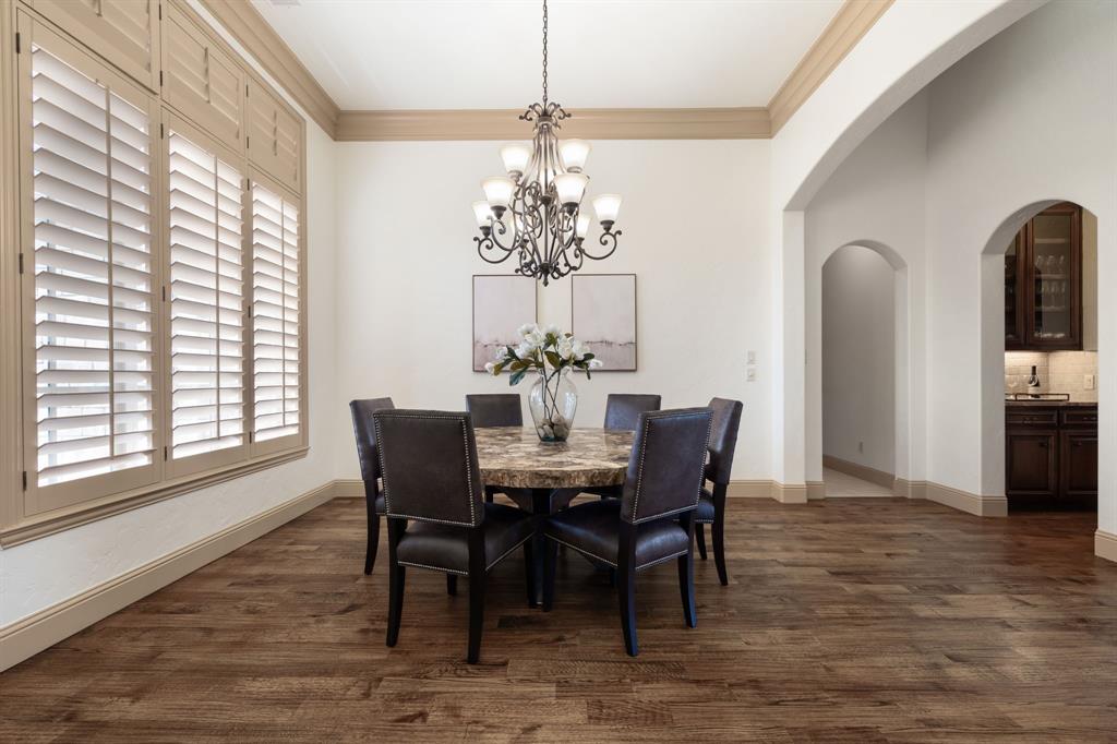 771 Hayden Road Lantana, TX 76226 - Photo 18 of 40 Beautiful crown molding and Plantation shuttersmake the dining room a perfect entertaining space!