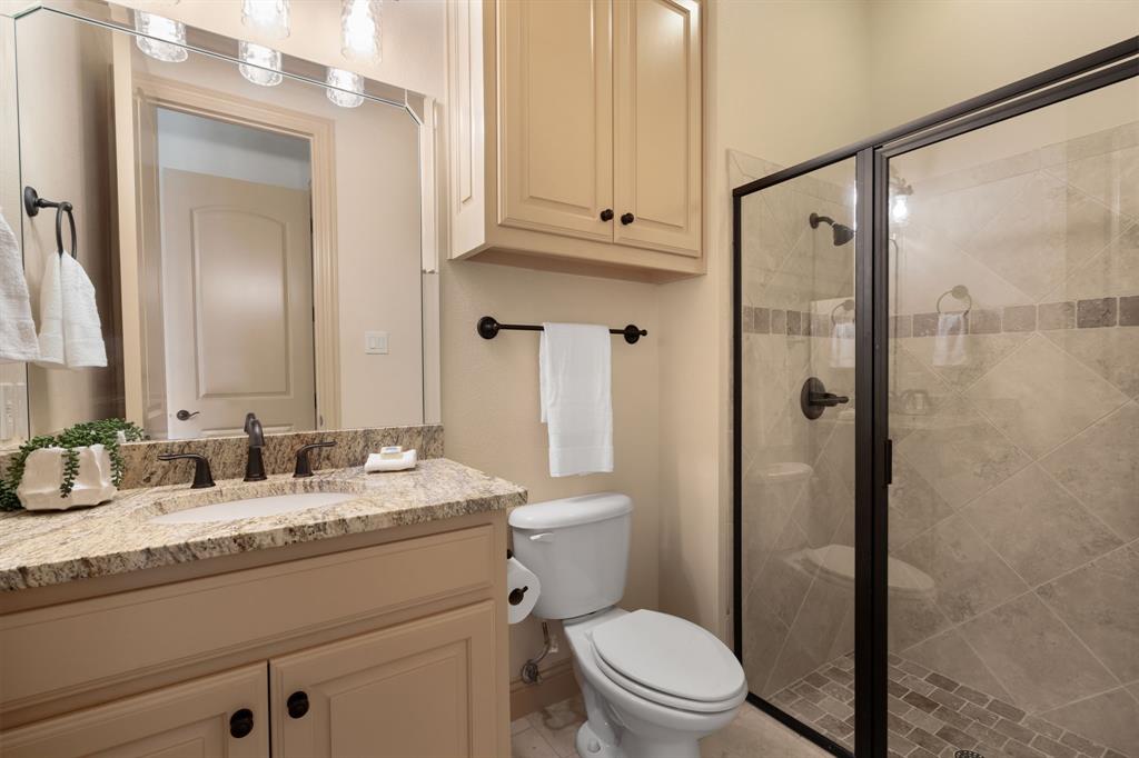 771 Hayden Road Lantana, TX 76226 - Photo 28 of 40 Third bathroom with a perfectly sized vanity and walk-in shower!