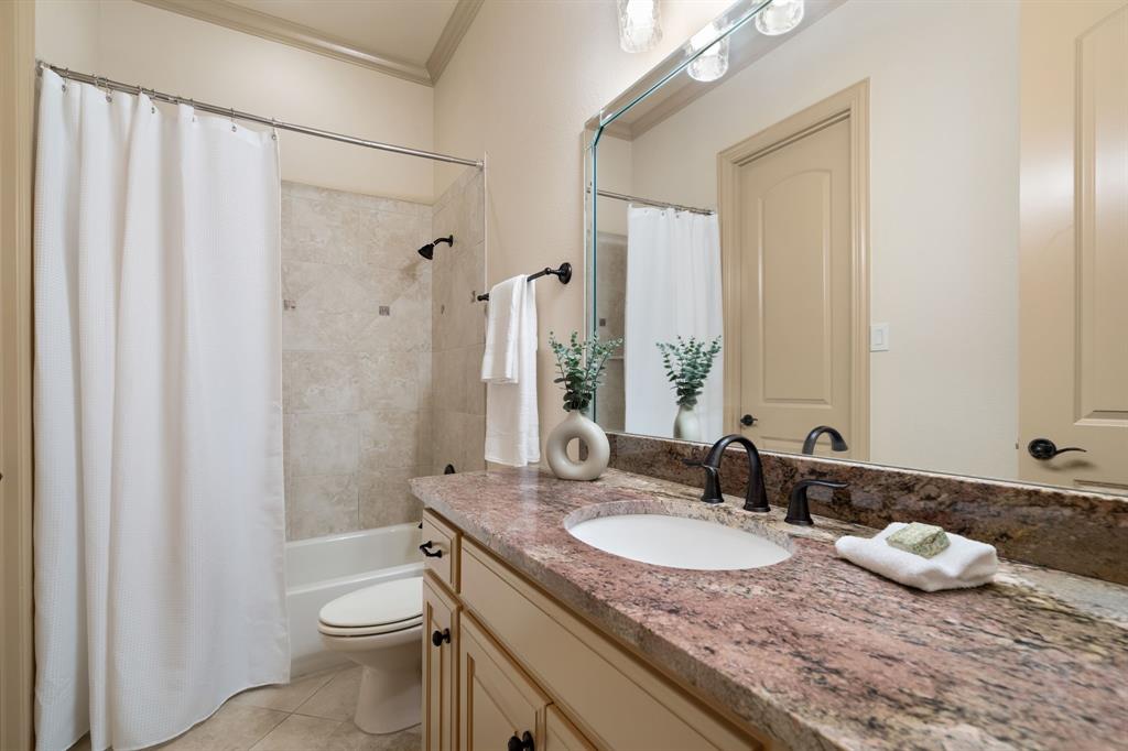 771 Hayden Road Lantana, TX 76226 - Photo 30 of 40 Fourth bathroom with a shower-tub combo!