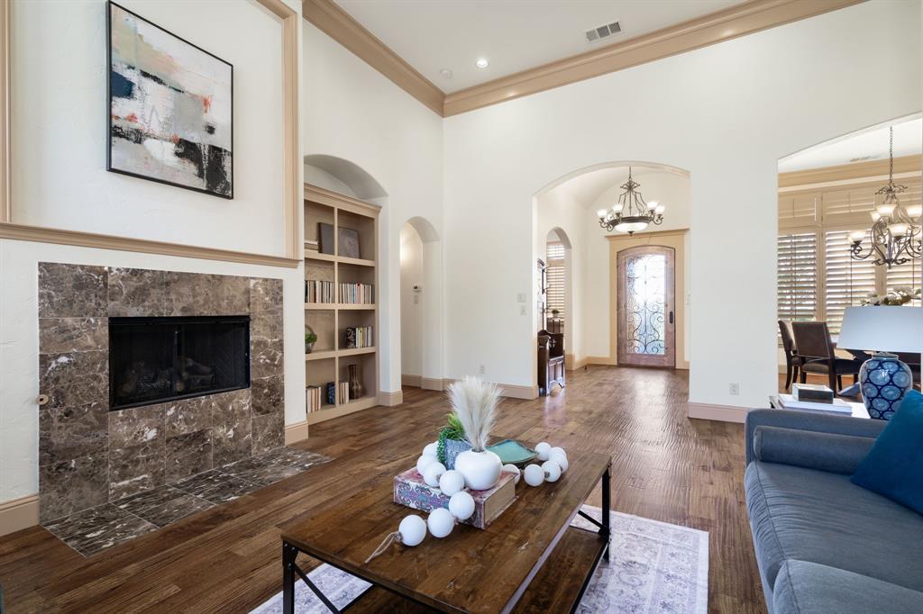 771 Hayden Road Lantana, TX 76226 - Photo 5 of 40 Stunning fireplace and built-ins ideal for storage!