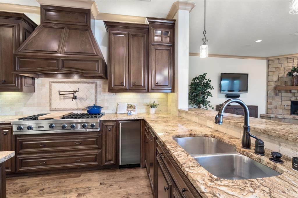 771 Hayden Road Lantana, TX 76226 - Photo 10 of 40 Plethora of built-in cabinets and counterspace!