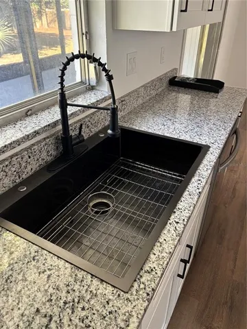 a kitchen with a stove and a microwave