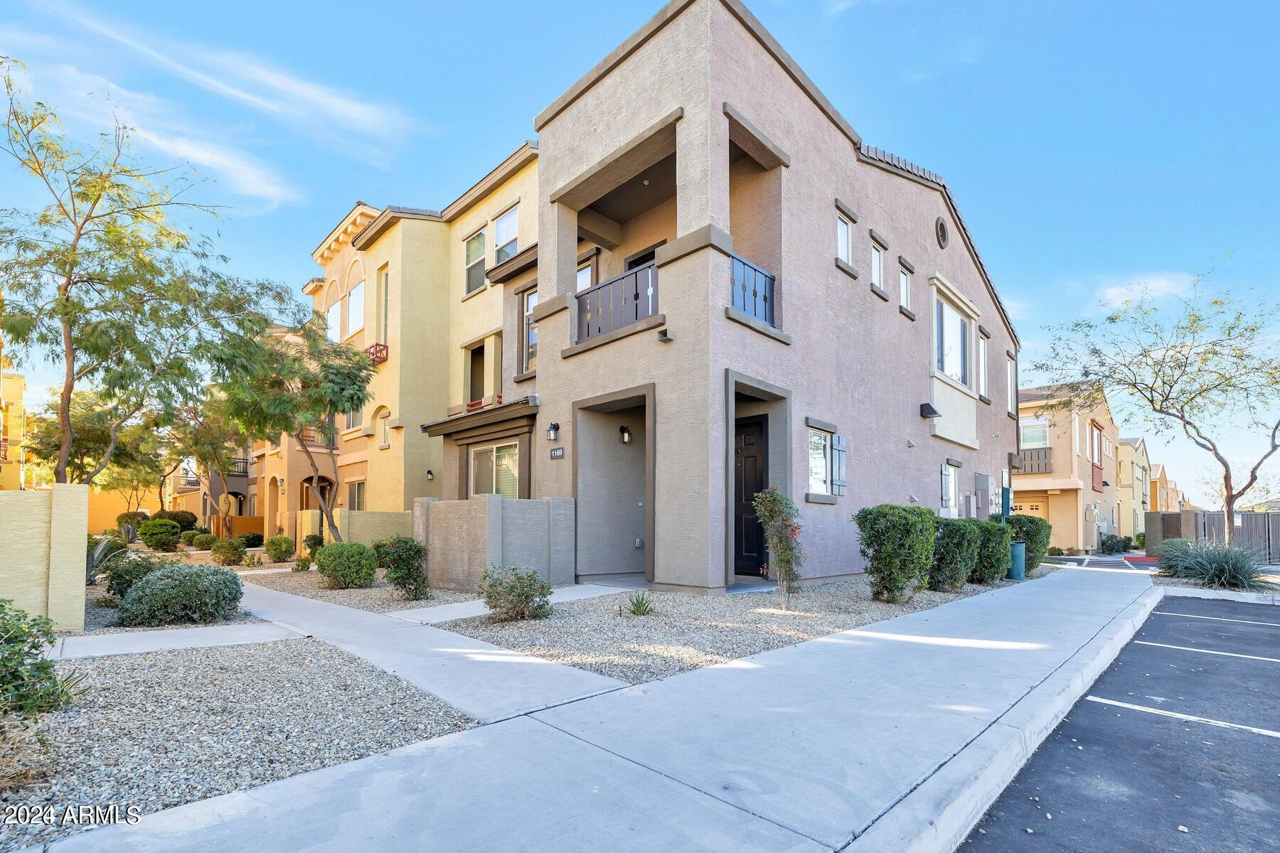 2150 West Alameda Road, Unit 1169 Phoenix, AZ 85085 - Photo 10 of 26 a view of a building with a street