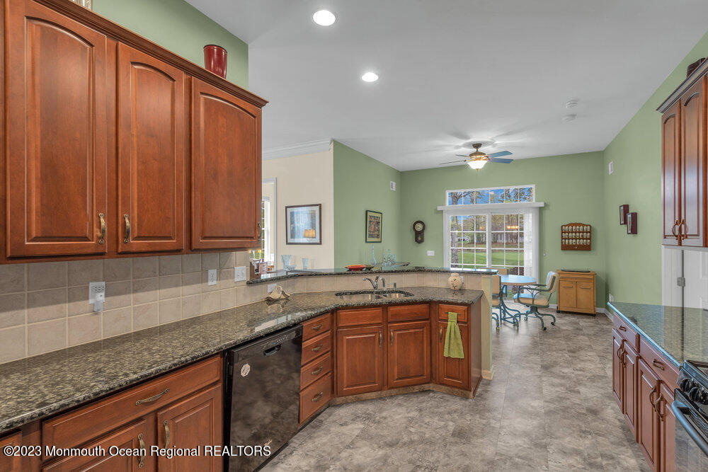10 Crooked Stick Road Jackson, NJ 08527 - Photo 14 of 52 a kitchen with a sink and cabinets