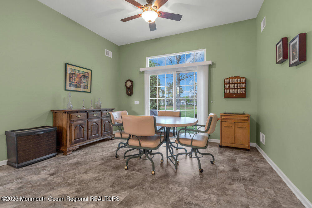 10 Crooked Stick Road Jackson, NJ 08527 - Photo 19 of 52 a view of a workspace with furniture and a window
