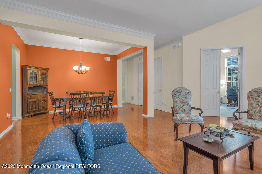10 Crooked Stick Road Jackson, NJ 08527 - Photo 20 of 52 a living room with furniture and a table