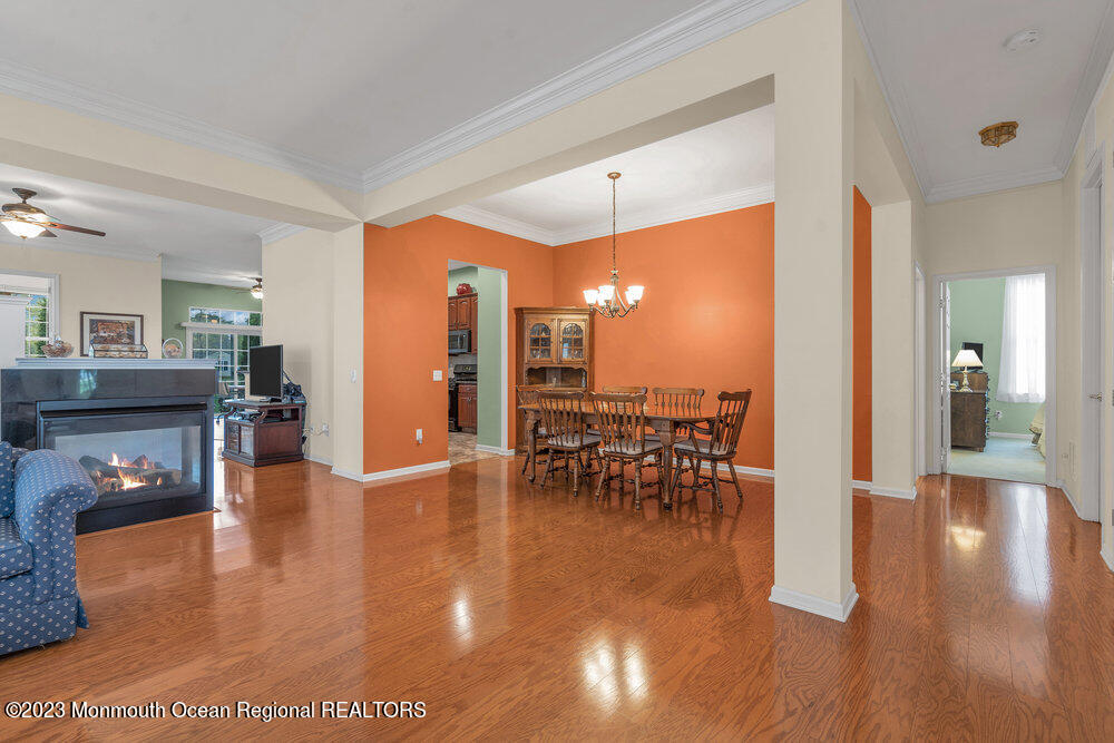 10 Crooked Stick Road Jackson, NJ 08527 - Photo 21 of 52 a view of a dining room with furniture and wooden floor