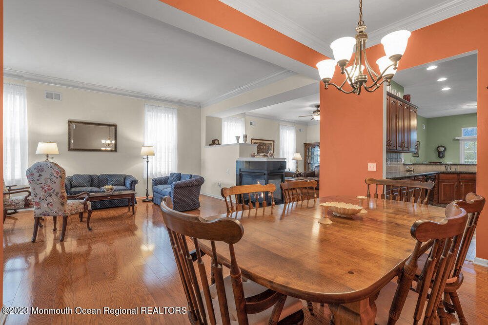 10 Crooked Stick Road Jackson, NJ 08527 - Photo 22 of 52 a view of a dining room with furniture and wooden floor