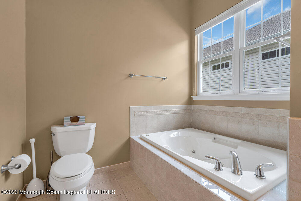 10 Crooked Stick Road Jackson, NJ 08527 - Photo 30 of 52 a bathroom with a sink and a toilet