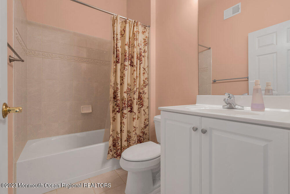 10 Crooked Stick Road Jackson, NJ 08527 - Photo 32 of 52 a bathroom with a sink toilet and shower