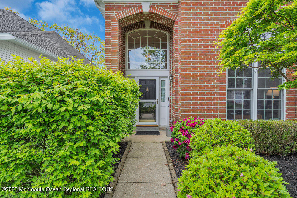 10 Crooked Stick Road Jackson, NJ 08527 - Photo 6 of 52 a front view of a house with lots of green space