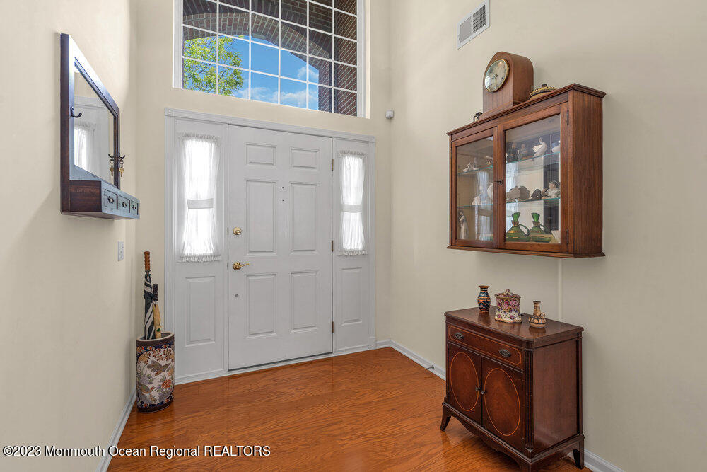 10 Crooked Stick Road Jackson, NJ 08527 - Photo 7 of 52 a view of an entryway with wooden floor