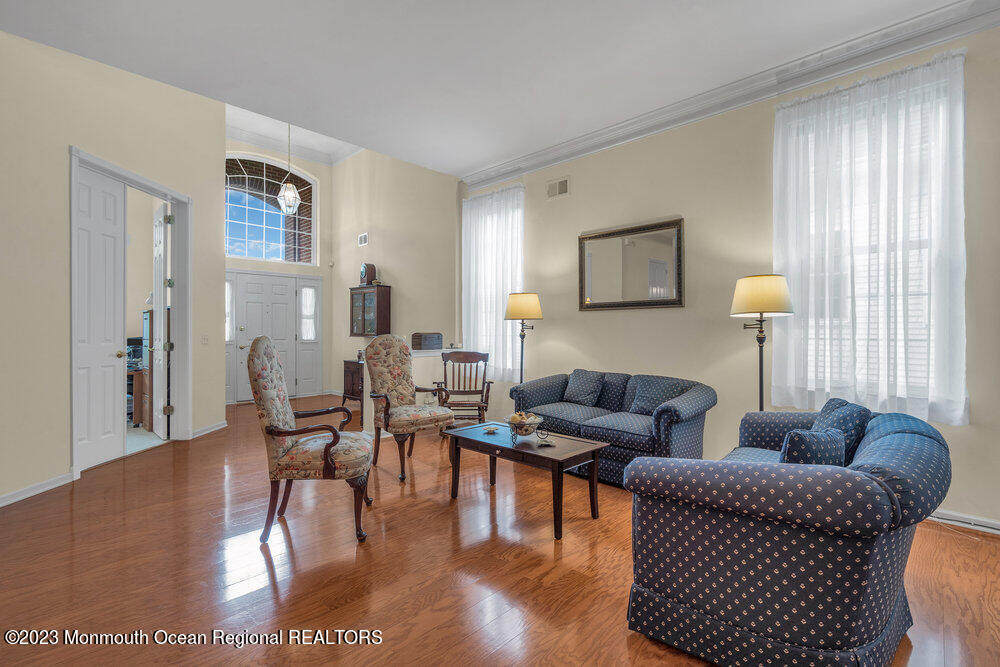 10 Crooked Stick Road Jackson, NJ 08527 - Photo 8 of 52 a living room with furniture and wooden floor