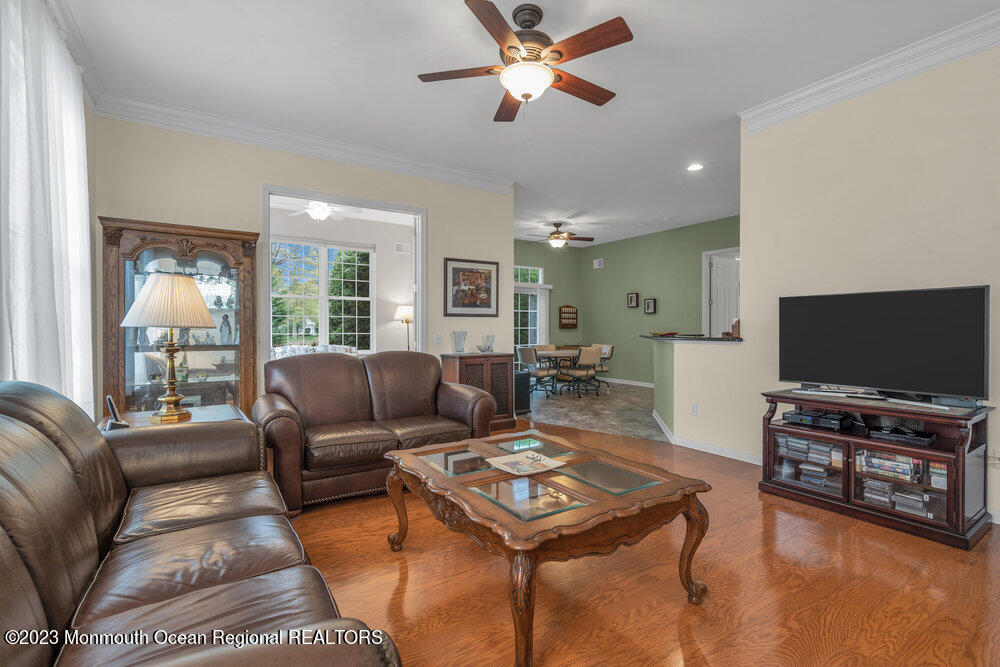 10 Crooked Stick Road Jackson, NJ 08527 - Photo 9 of 52 a living room with furniture and a flat screen tv