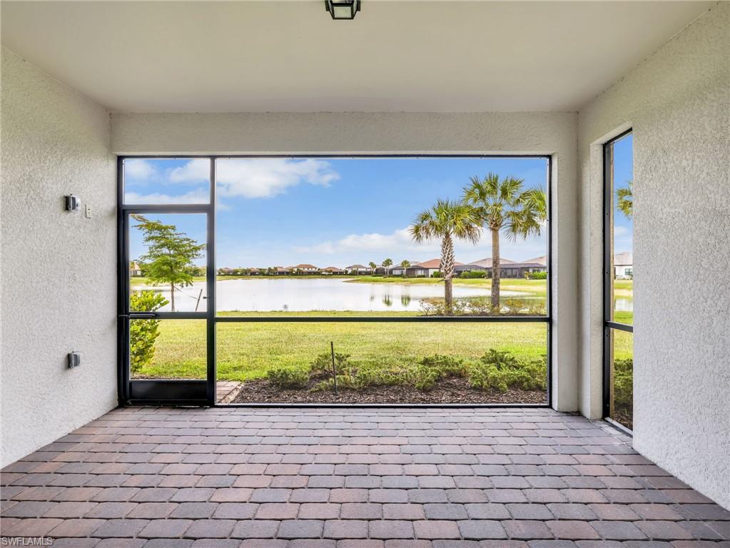 18278 Ridgeline Drive Estero, FL 33928 - Photo 26 of 45 a view of door with an outdoor space