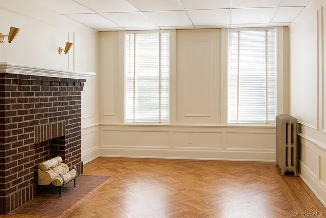 a view of a livingroom with wooden floor