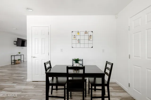 a view of a dining room with furniture