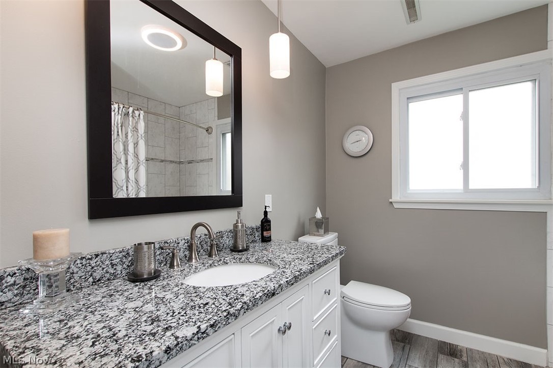 5224 Ridgebury Boulevard Cleveland, OH 44124 - Photo 17 of 21 This bathroom was just completely updated!! Isn't it gorgeous?!