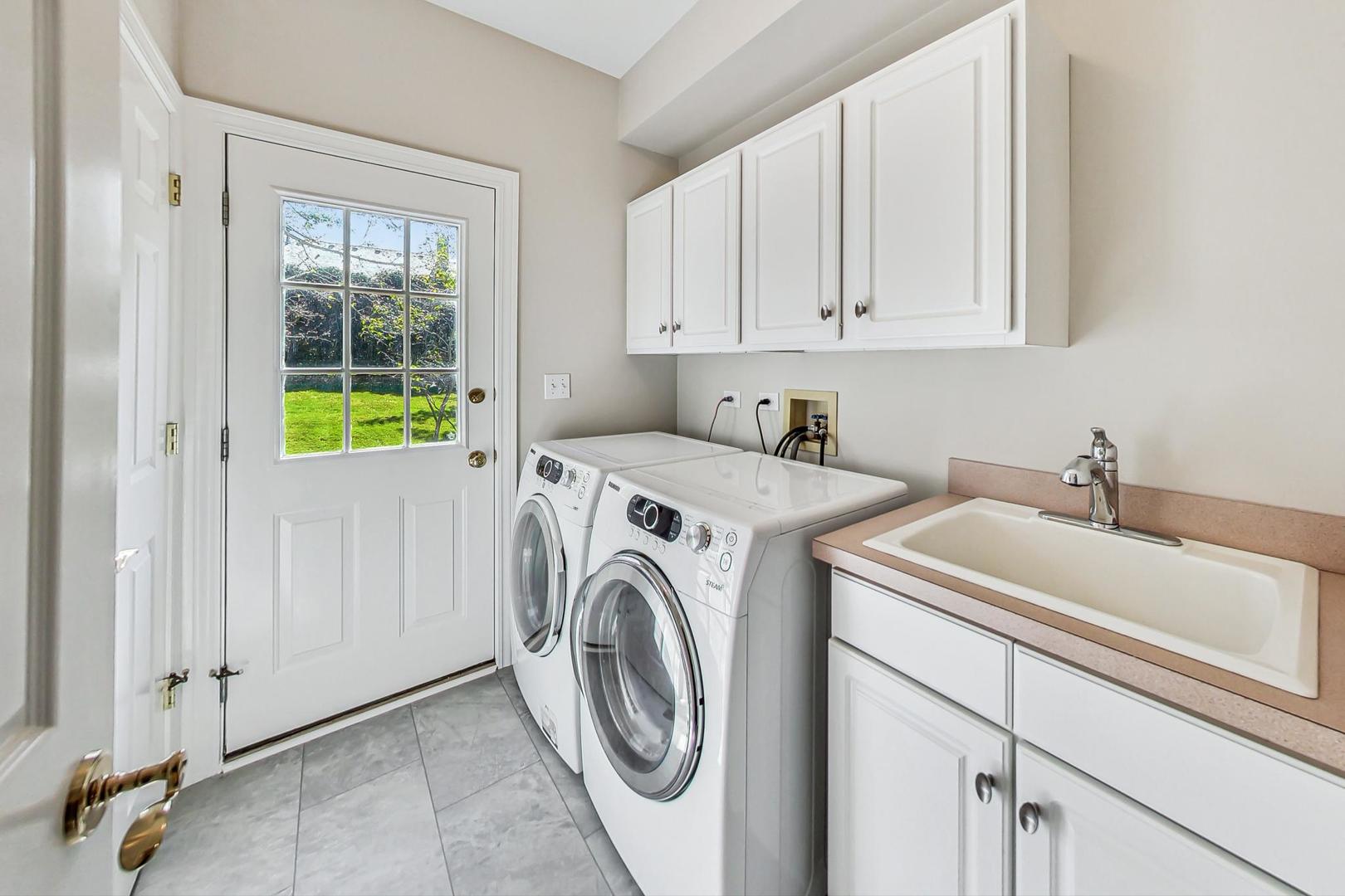 1429 Castleton Road Libertyville, IL 60048 - Photo 15 of 30 a utility room with dryer and washer