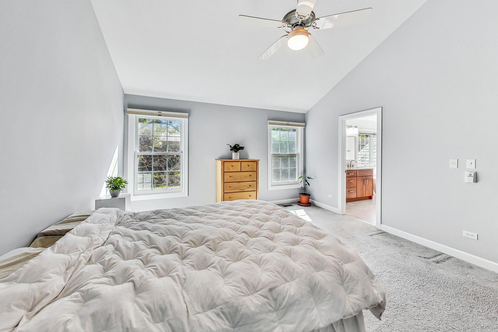 1429 Castleton Road Libertyville, IL 60048 - Photo 16 of 30 a view of a bedroom with window and a ceiling fan