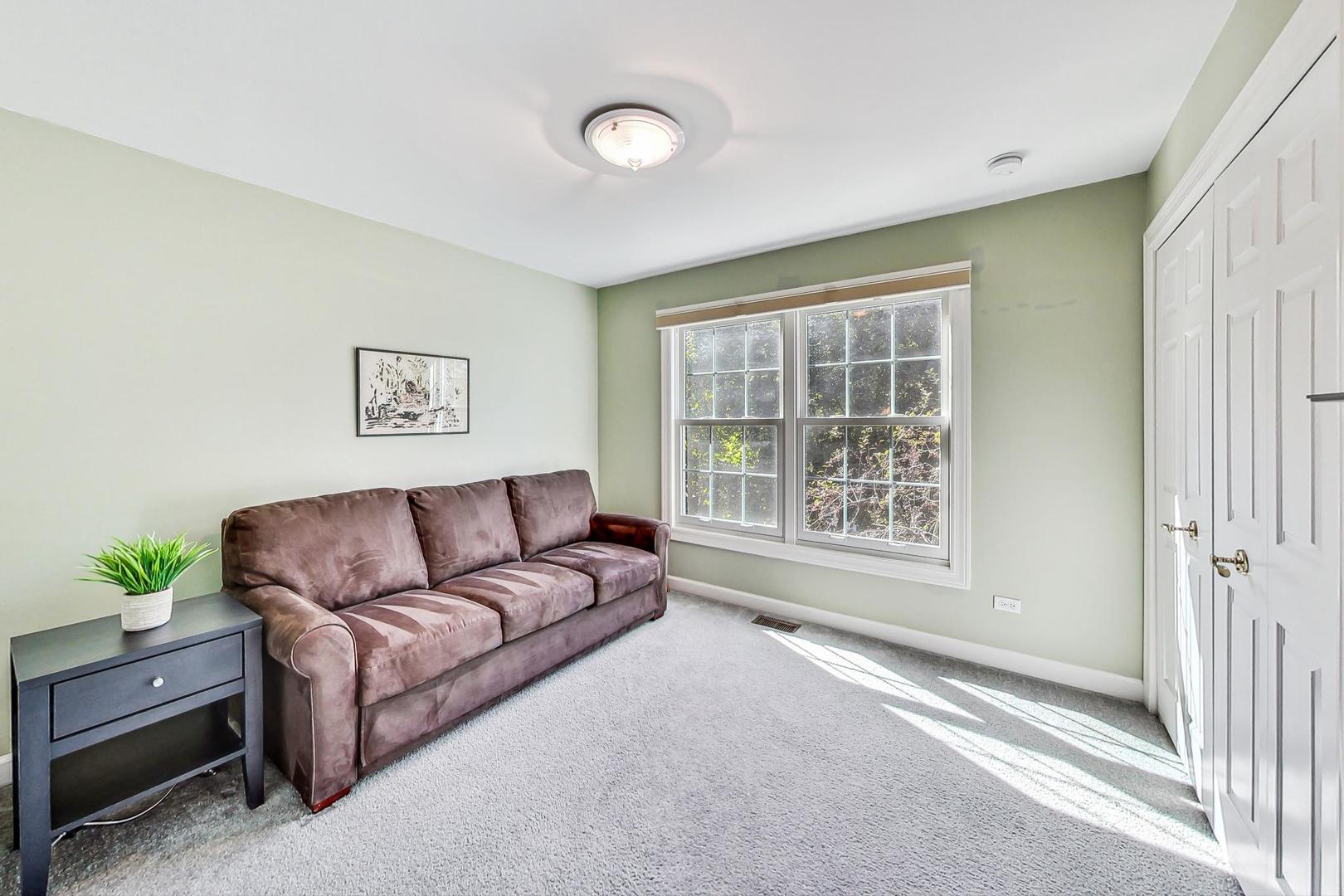 1429 Castleton Road Libertyville, IL 60048 - Photo 21 of 30 a living room with furniture and a window