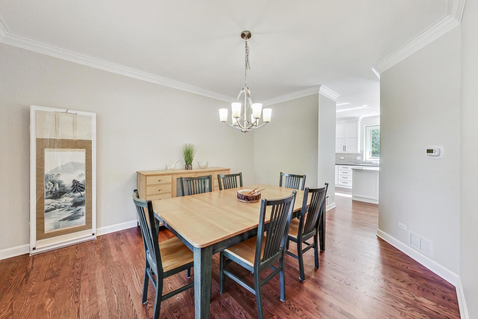 1429 Castleton Road Libertyville, IL 60048 - Photo 5 of 30 a view of a dining room with furniture window and wooden floor