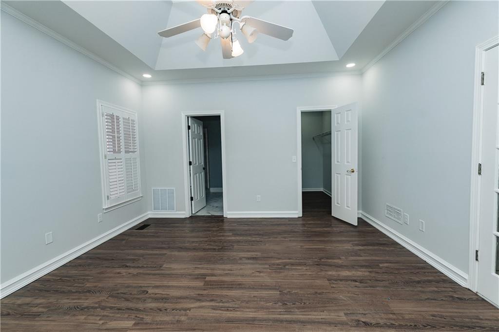 525 Rams Way Tucker, GA 30084 - Photo 29 of 41 a view of an empty room with wooden floor