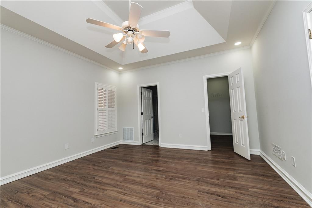 525 Rams Way Tucker, GA 30084 - Photo 30 of 41 a view of an empty room with wooden floor