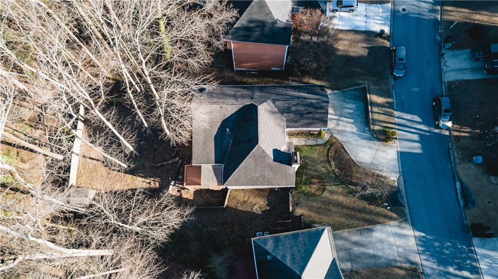 525 Rams Way Tucker, GA 30084 - Photo 4 of 41 a backyard of a house with lots of green space