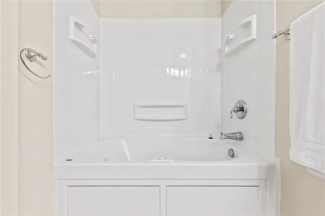 a bathroom with a bathtub