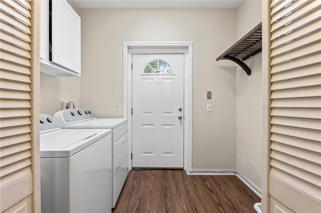 a storage room with a washer and dryer