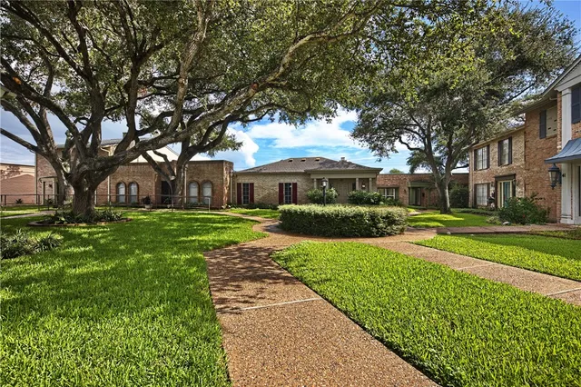 a view of a house with a big yard