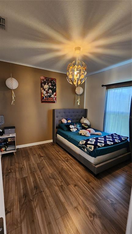 4540 Lake Russell Road Kissimmee, FL 34746 - Photo 20 of 35 a view of a room with furniture and chandelier