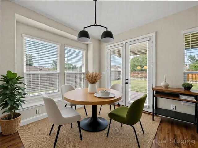 a living room with fireplace furniture and a wooden floor